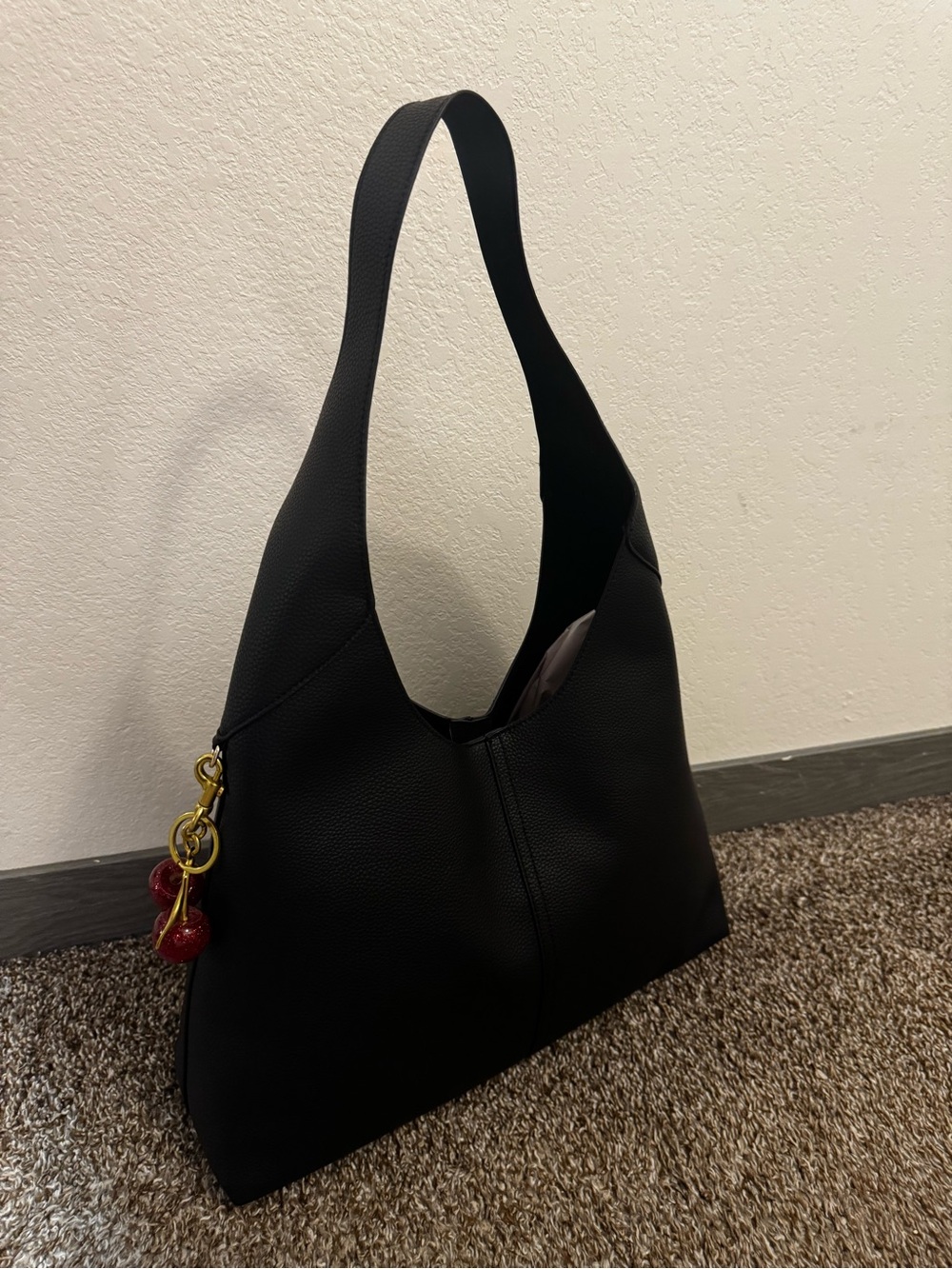 Minimalist Black Leather Shoulder Bag with Gold Accent
